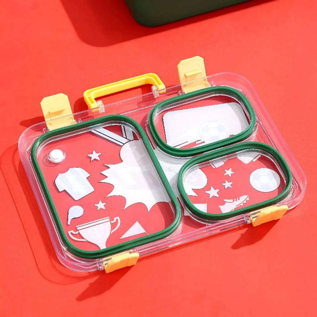 Transparent lunch box with green and yellow accents on a red background