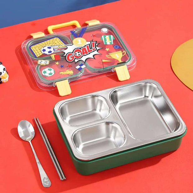 Children's lunch box set with compartments, spoon, and chopsticks on a red background