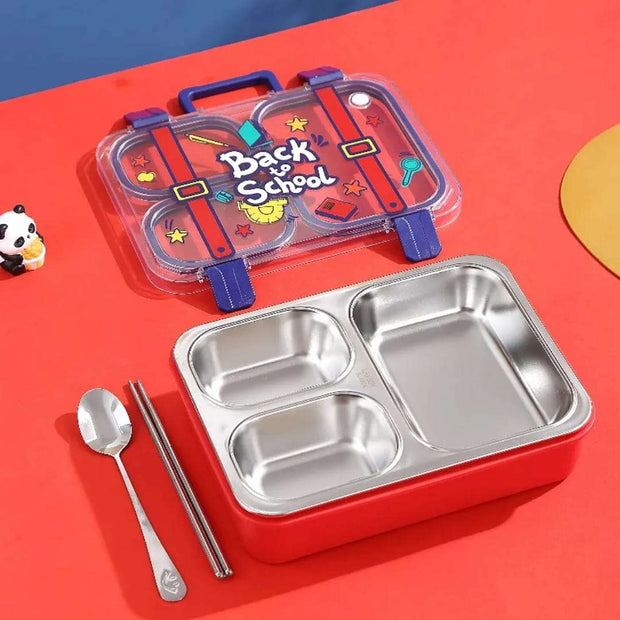 Stainless steel lunch box with compartments, spoon, and chopsticks on a red background
