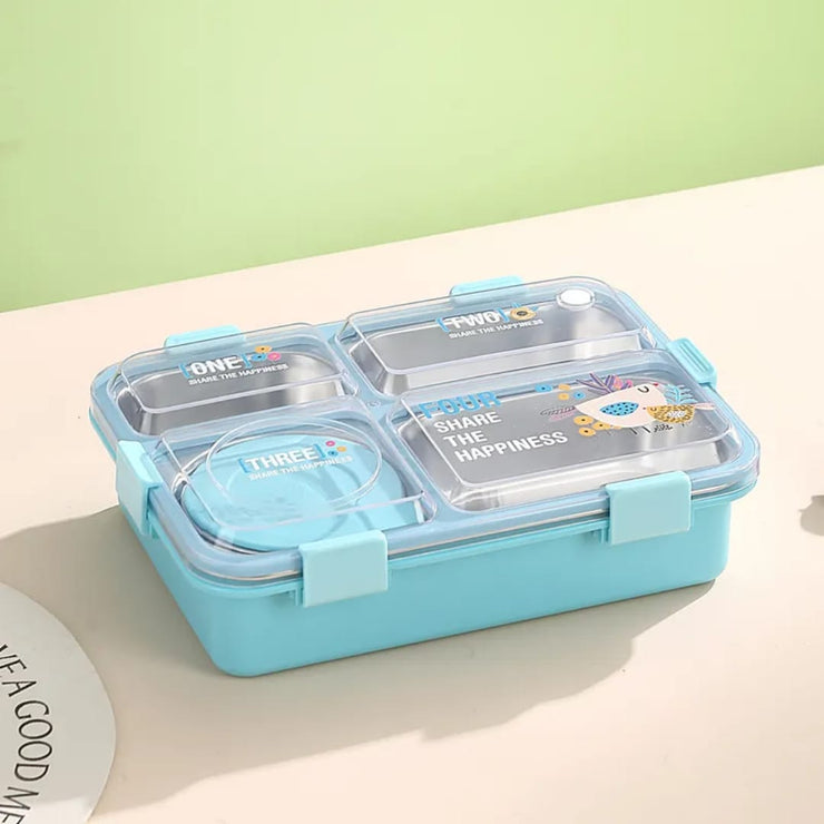 Blue bento box with compartments on a light beige surface