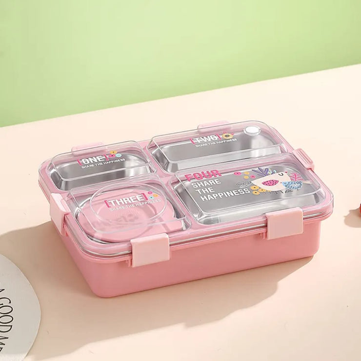 Pink bento box with compartments on a light pink surface