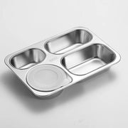 Stainless steel compartment tray with a lid on a light gray background