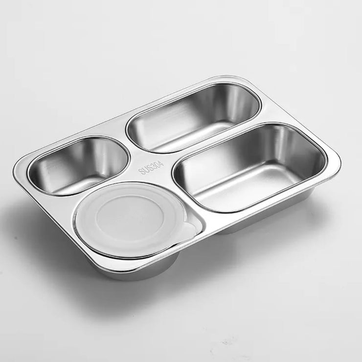 Stainless steel compartment tray with a lid on a light gray background
