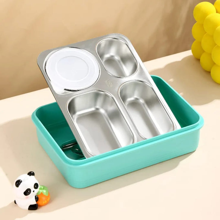 Stainless steel bento box with a turquoise base on a beige surface