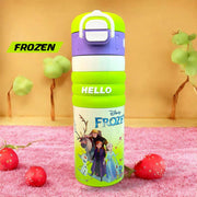 Green water bottle with Disney Frozen design on a pink surface
