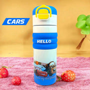 Children's water bottle with Disney Cars design on a pink surface with strawberries.