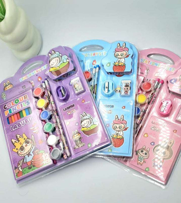 Three colorful stationery sets with cartoon characters on their packaging.