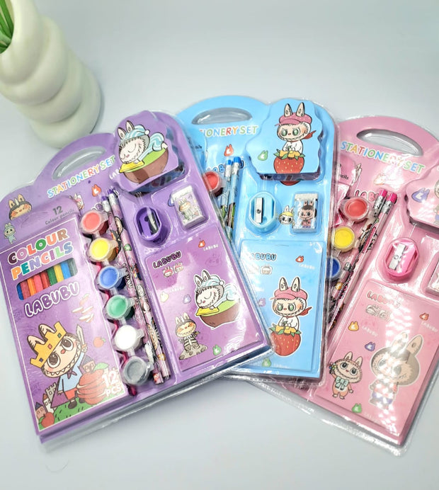Three colorful stationery sets with cartoon characters on their packaging.