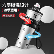 Two insulated water bottles with panda design on a black background