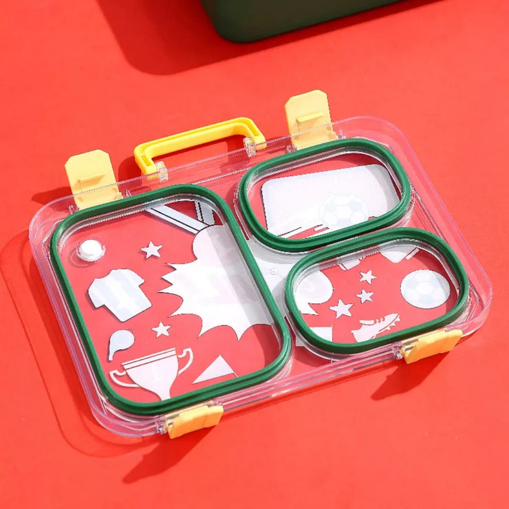 Transparent lunch box with green and yellow accents on a red background